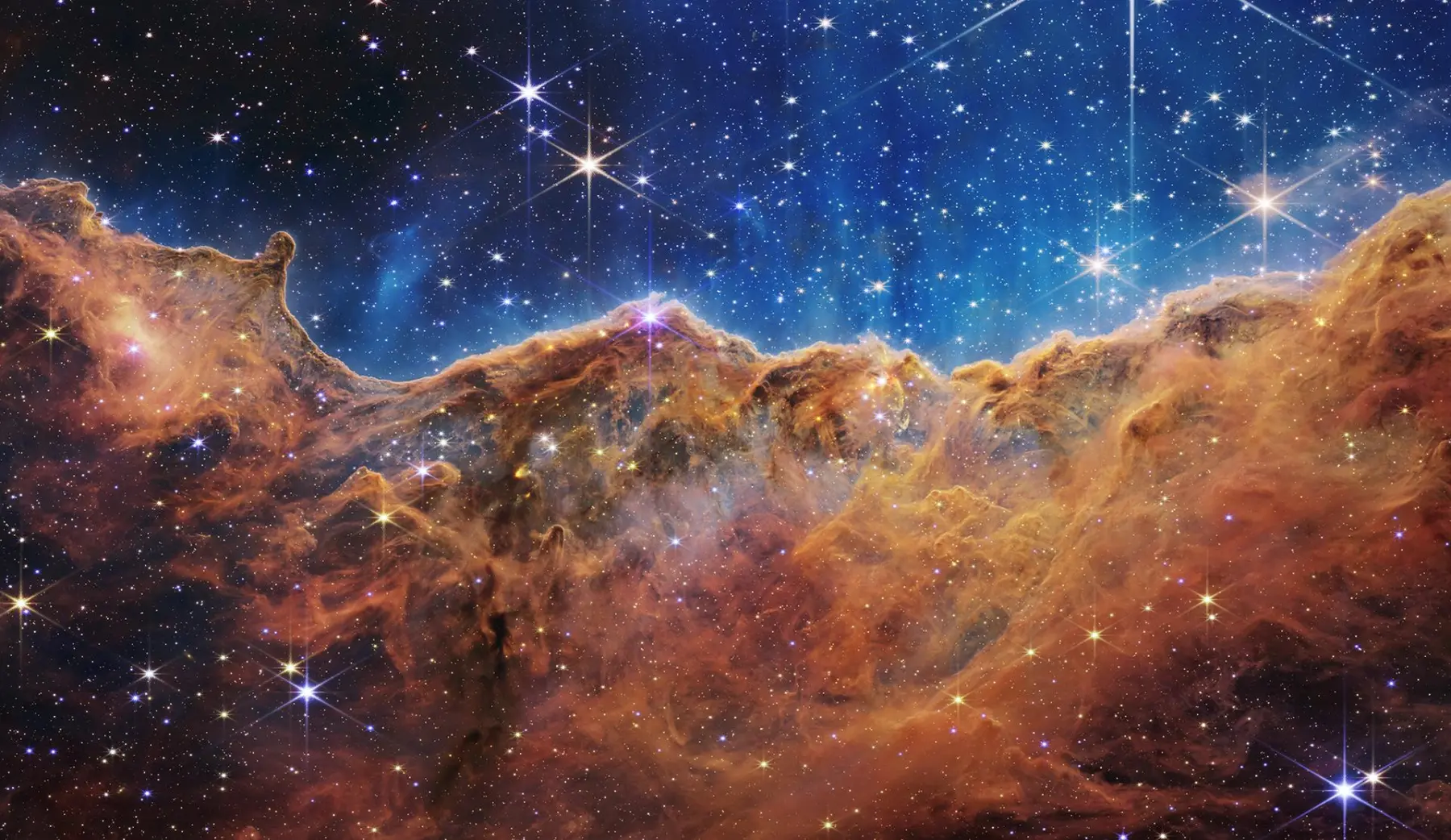 The Cosmic Cliffs of the Carina Nebula, imaged by the James Webb Space Telescope